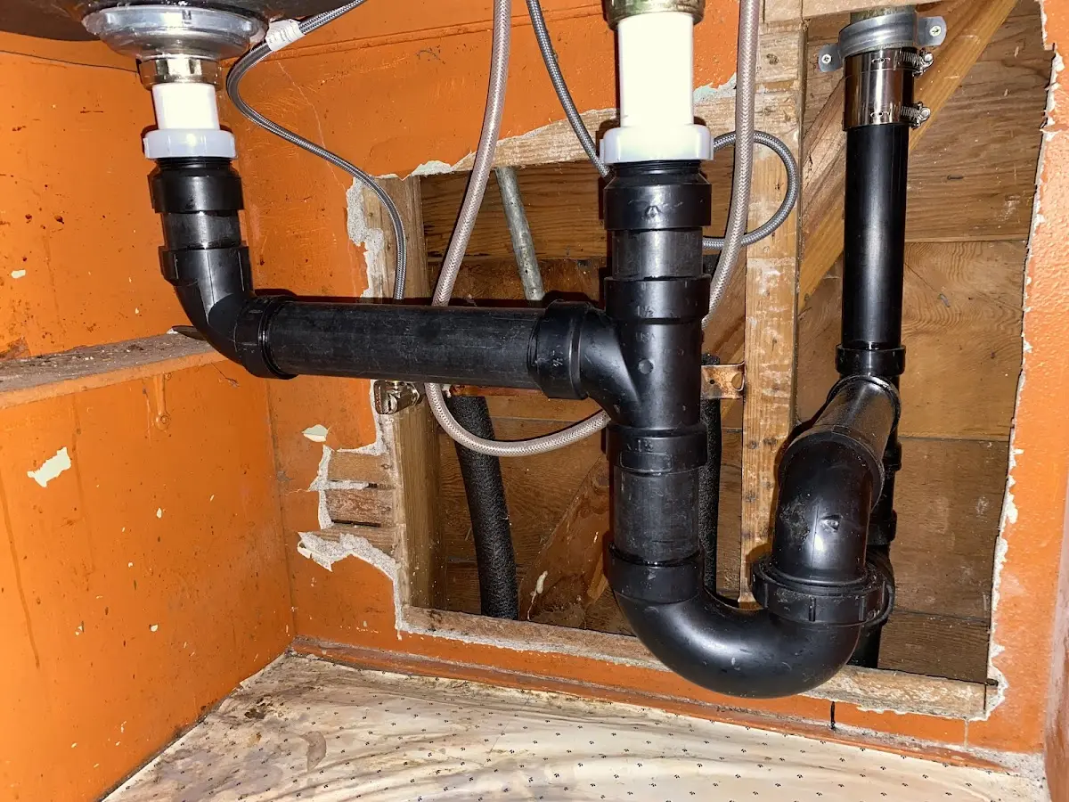 Professional Garbage Disposal Repair equipment and tools on the job in Plymouth